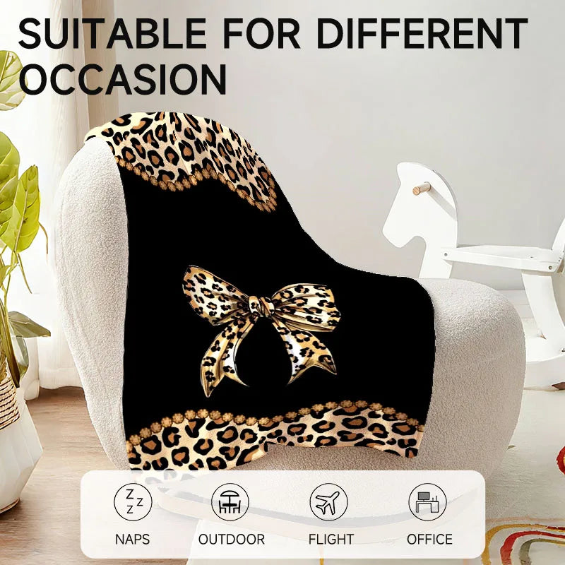 1 piece leopard print bow flannel blanket, perfect for sofa, bed, office. Ideal gift for family, friends, holidays.