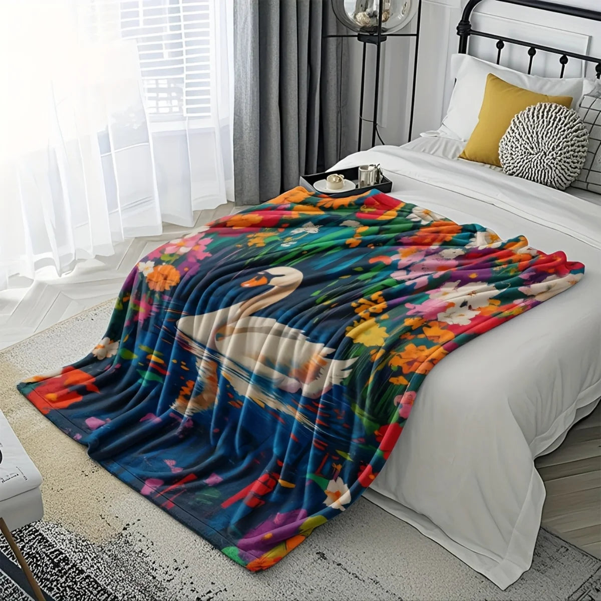 A cozy swan and floral-themed flannel blanket - soft and warm, perfect for camping, sofas, beds, and chairs, a great holiday gif