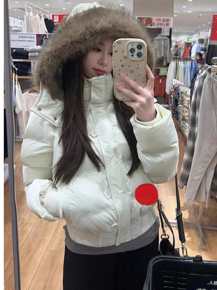 Women's Hooded Winter Puffer Jacket. Thick Padded Coat with Faux Fur Trim