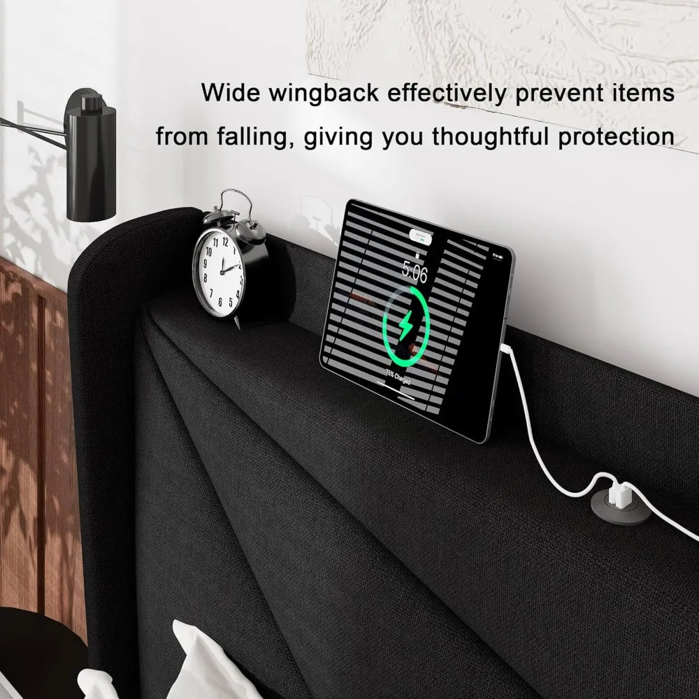 "linen-covered king-sized platform bed with wingback headboard and built-in charging station"