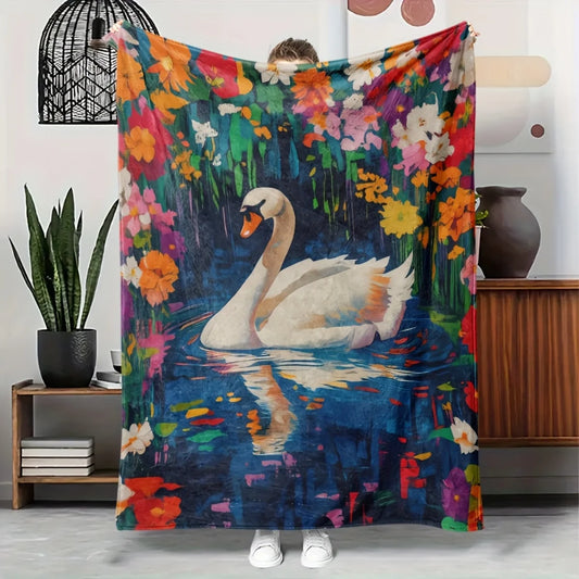 A cozy swan and floral-themed flannel blanket - soft and warm, perfect for camping, sofas, beds, and chairs, a great holiday gif
